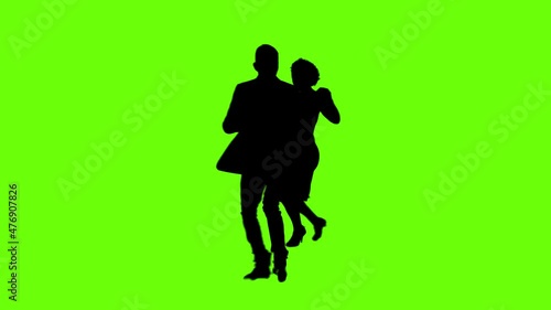 A Young couple dancing tango profesional dancers on Green Screen Silhouette Pair in argentinian spanish dress performs dance movement. 4K 60fps Argentina France Chroma key Argentina Buenos Aires Messi