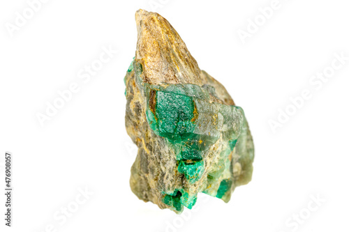 macro stone mineral emerald on a white background