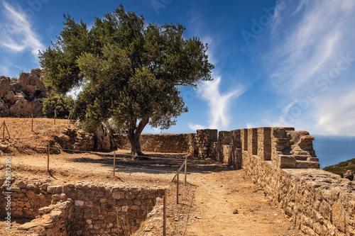 Ancient stone ruins in fortress Angelocastro, Corfu, Greece. photo