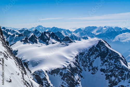 Switzerland, Panoramic view on Snow Alps and Blue Sky around Titlis mountain © AlehAlisevich