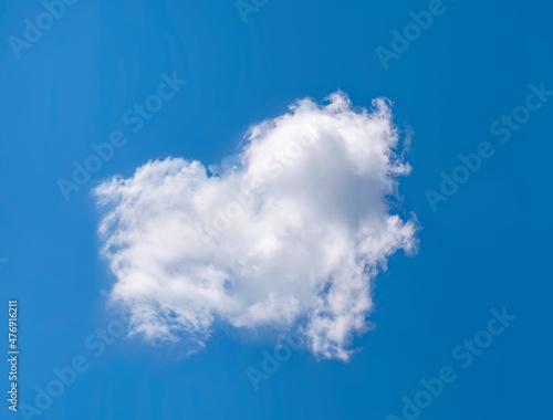 Blue sky with white clouds, love theme background. Clear blue sky with heart-shaped clouds with space for text