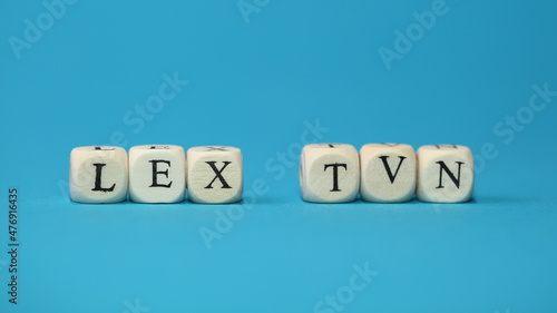 Letters made words LEX TVN on blue background photo