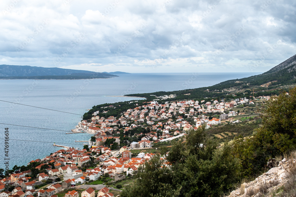 Picturesque scenery views of the Adriatic Sea from Brac Island, Croatia central Dalmatia, beautiful water and beach views taken in the quieter winter months-no people, historic architecture