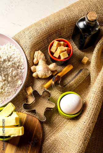 Gingerbread ingredients and accessories for making ginger dough.