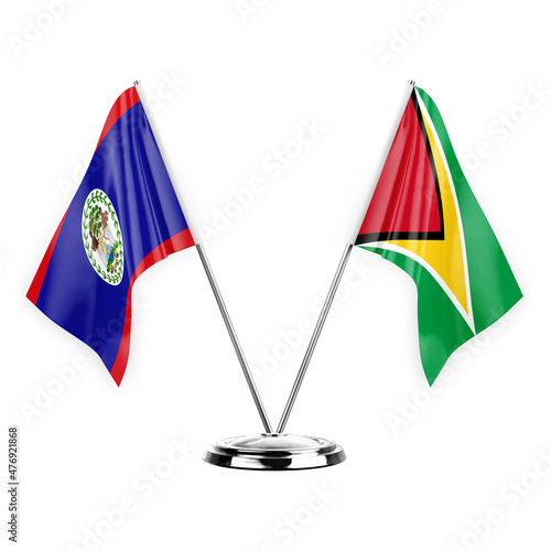 Two table flags isolated on white background 3d illustration, belize and guyana
