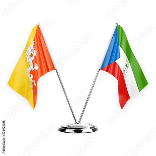 Two table flags isolated on white background 3d illustration, bhutan and equatorial guinea photo