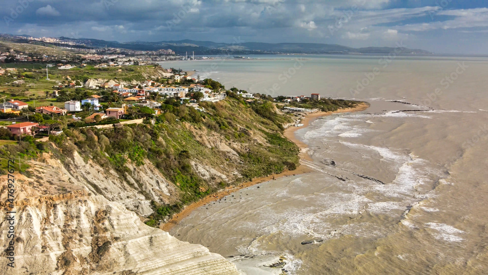 Aerial drone viewpoint on Stair of the Turks. Scala dei Turchi is a rocky cliff on the southern coast of Sicily, Italy