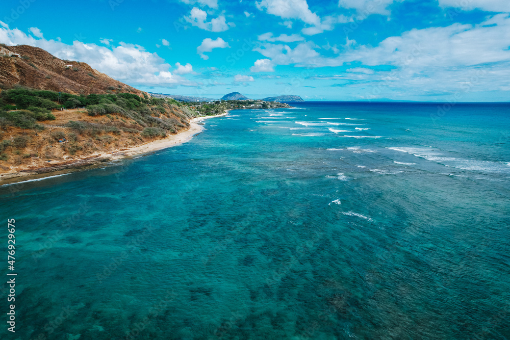 Aerial view of turquoise blue clear waters and Diamond Head in Honolulu, Hawaii, USA Aerial view of turquoise blue clear waters and Diamond Head in Honolulu, Hawaii, USA