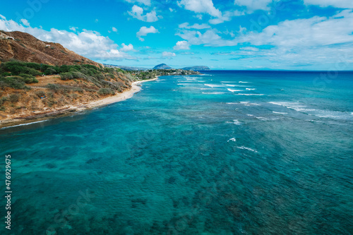 Aerial view of turquoise blue clear waters and Diamond Head in Honolulu  Hawaii  USA 