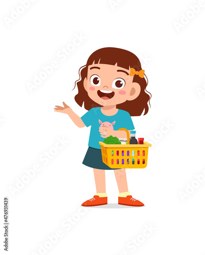 cute little girl carry basket full of groceries