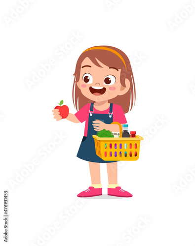 cute little girl carry basket full of groceries