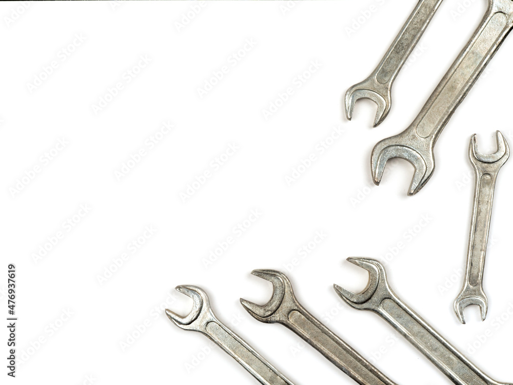 Text insertion frame lined with bolts, nuts and wrenches Text insertion frame lined with bolts, nuts and wrenches