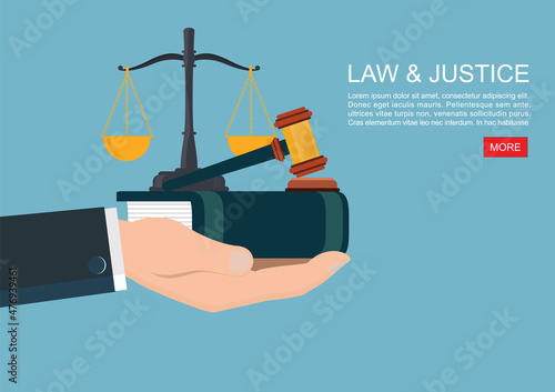 Law books and gavel with Hand concept.