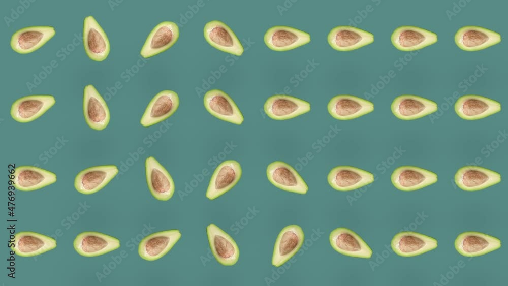 Colorful fruit pattern of fresh avocados on green background. Seamless pattern with avocado. Realistic animation. 4K video motion Colorful fruit pattern of fresh avocados on green background. Seamless pattern with avocado. Realistic animation. 4K video motion