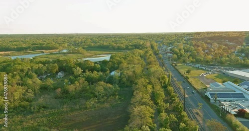 Wallpaper Mural Aerial view of American town single family homes a driving many cars, a residential district Sayreville near river in New Jersey US Torontodigital.ca