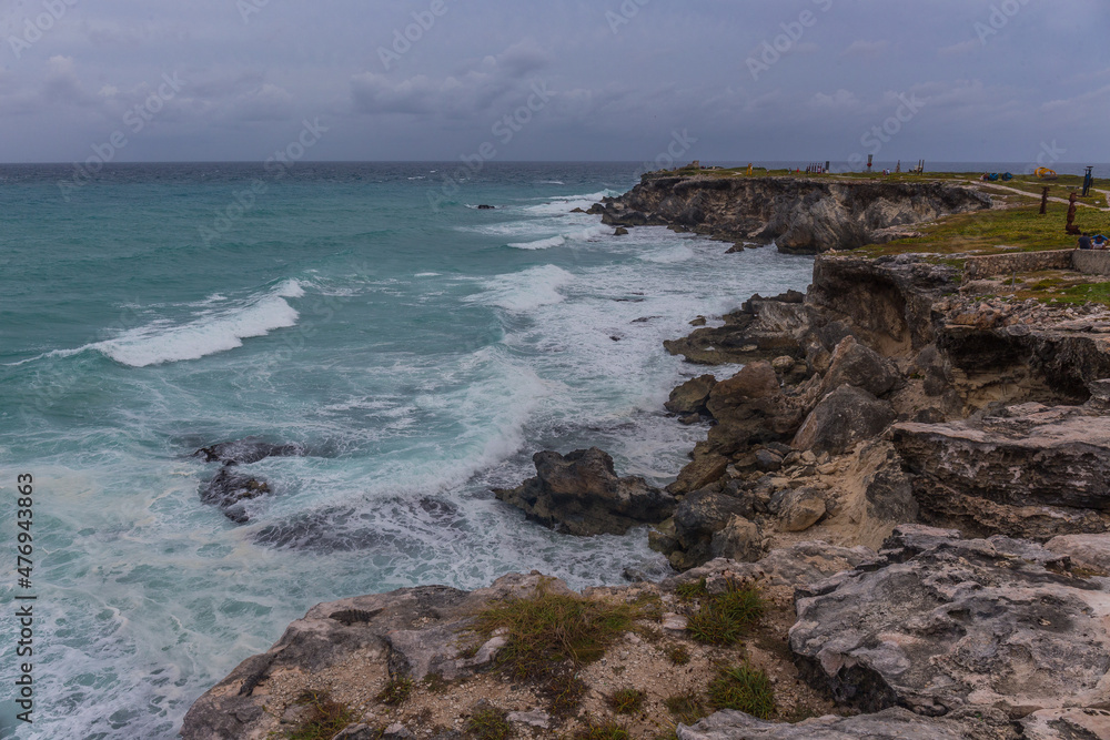 Beautiful view of rocky cliff at sunrise on the the southern part of the Isla Mujeres in Caribbean, Mexico