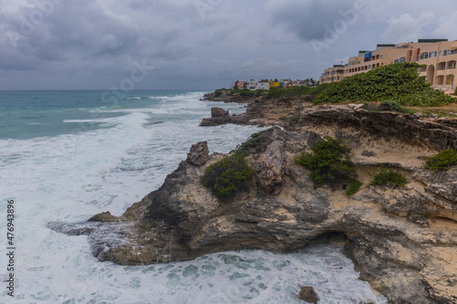 Beautiful view of rocky cliff at sunrise on the the southern part of the Isla Mujeres in Caribbean, Mexico photo