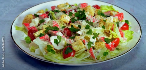vegetable salad with Caesar croutons on a plate