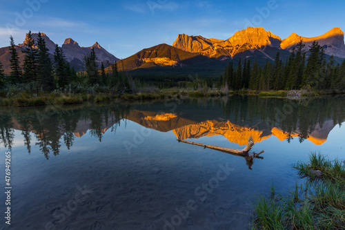 Sunrise view of Policeman's Creek along the Bow River outside Canmore, Alberta. Mount Lawrence Grassi with Ha Ling Peak on the far right of Mount Grassi.