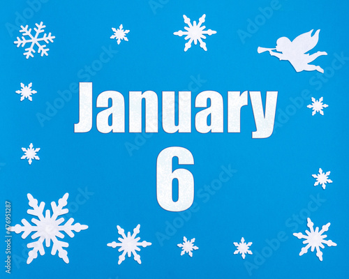 January 6th. Winter blue background with snowflakes  angel and a calendar date. Day 6 of month.