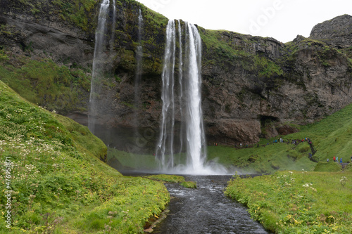 Beautiful aerial footage of the Seljalandsfoss and Gljufrabui waterfalls in Iceland on summer