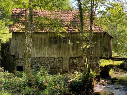 Old sawmill plant with water turbine or mill of the Kovač family, Zamost - Gorski kotar, Croatia (Stari pogon žage sa vodenom turbinom ili mlin obitelji Kovač, Zamost - Gorski kotar, Hrvatska) photo