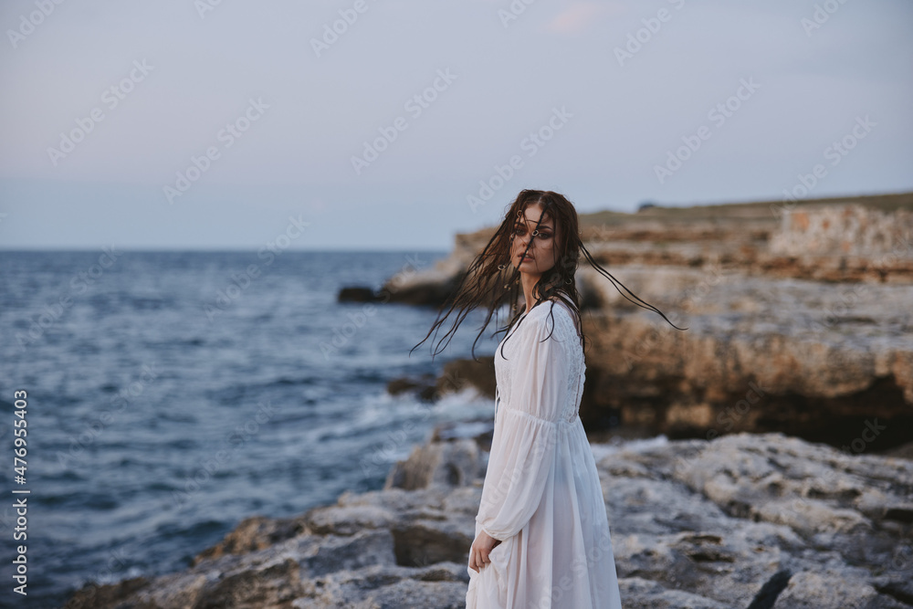 Beautiful woman enjoying for view of the beautiful sea on her holiday nature Beautiful woman enjoying for view of the beautiful sea on her holiday nature
