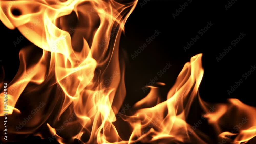 The flames of the fire burn brightly. On a black background. Filmed is slow motion 1000 frames per second. High quality FullHD footage The flames of the fire burn brightly. On a black background. Filmed is slow motion 1000 frames per second. High quality FullHD footage