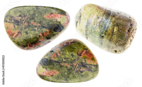set of various unakite stones cutout on white photo