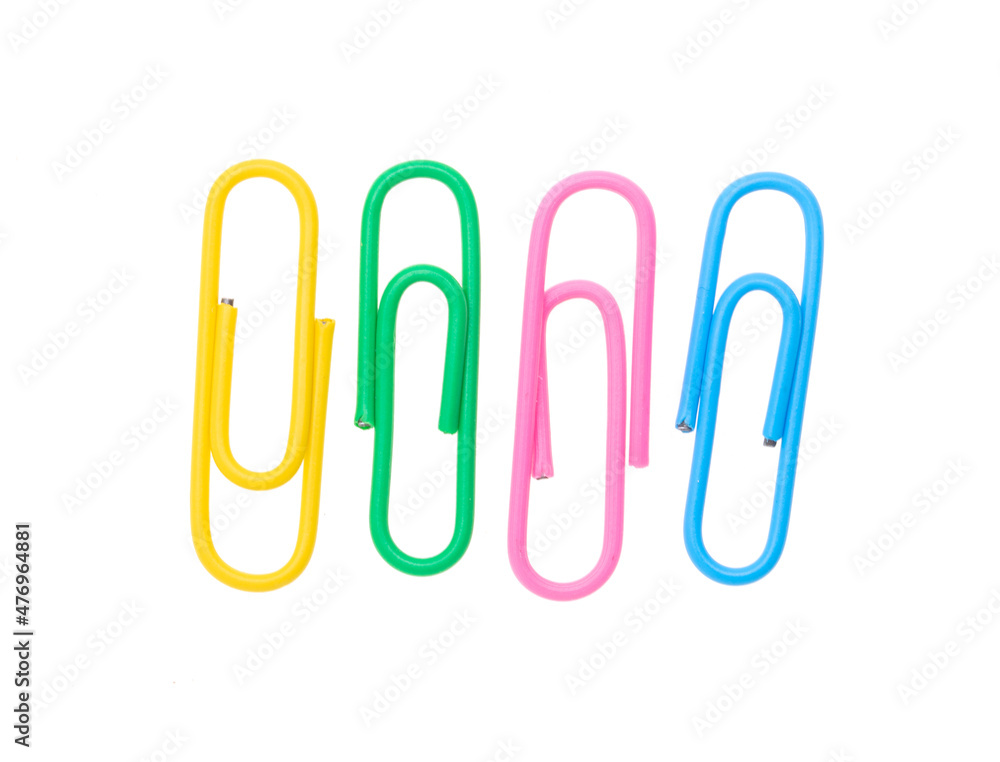 Multi-colored paper clips isolated on a white Multi-colored paper clips isolated on a white