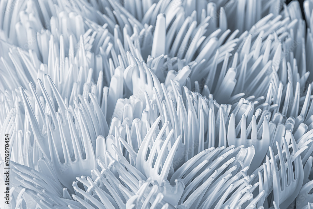 Obraz premium white plastic fork for background or texture