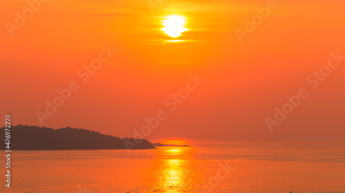 The background of the sea by the evening sea  with natural beauty  sea water  rocks  sky  and fishermen are fishing by the river bank  is a pleasure during travel.