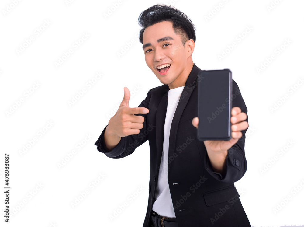 Happy Business man holding smartphone in hand and pointing at device Happy Business man holding smartphone in hand and pointing at device