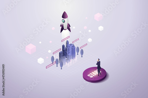 Businessman presses on the start button of a rocket launcher.