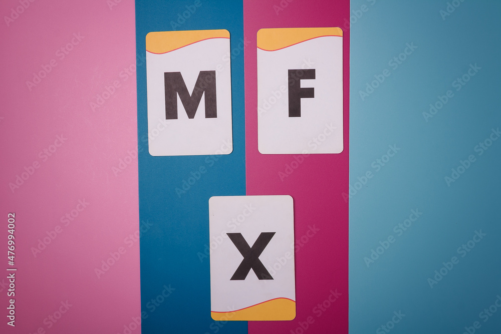 Male, female and queer, agender, gender neutral symbolic letters on colorful background. Non-binary people rights. Gender question Male, female and queer, agender, gender neutral symbolic letters on colorful background. Non-binary people rights. Gender question