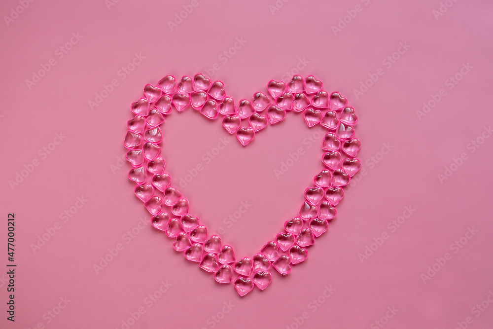 Valentine's day concept. Heart of beads in the shape of a pink heart.
