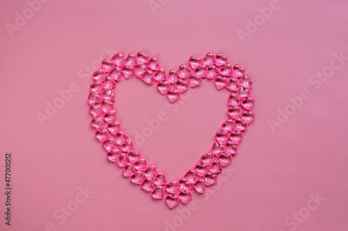 Valentine s day concept. Heart of beads in the shape of a pink heart.