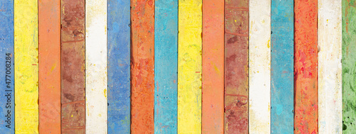 background of chalk pastels in various colors to use a banner