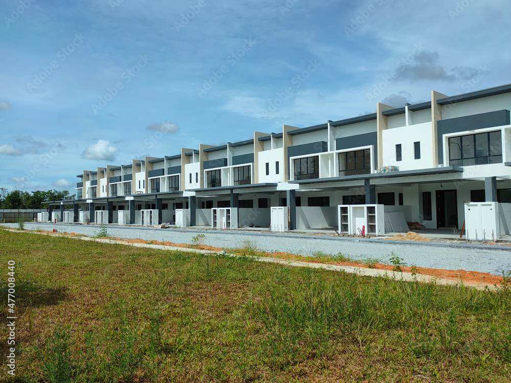 SEREMBAN, MALAYSIA -APRIL 16, 2020: Selected focused on new double story terrace house under construction in Malaysia. Designed by an architect with a modern and contemporary style. 
