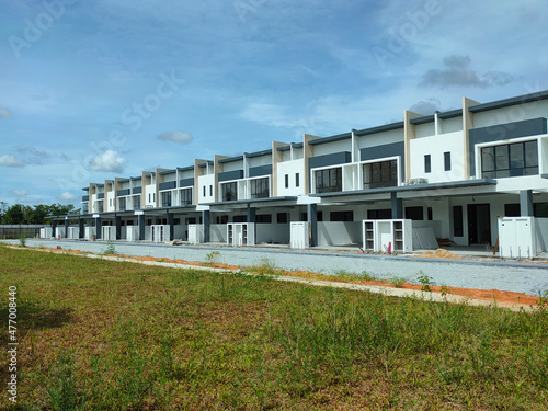 SEREMBAN, MALAYSIA -APRIL 16, 2020: Selected focused on new double story terrace house under construction in Malaysia. Designed by an architect with a modern and contemporary style. 