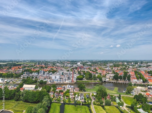 Sunny summer aerial cityscape of Gouda, cheese capital town in Netherlands  photo