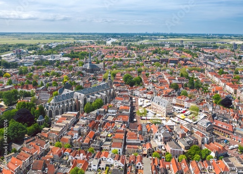 Obraz na płótnie Sunny summer aerial cityscape of Gouda, cheese capital town in Netherlands w salonie
