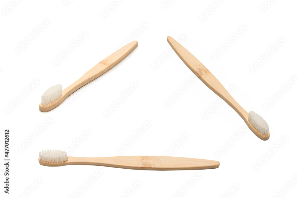 Bamboo toothbrush isolated on a white background. Bamboo toothbrush isolated on a white background.