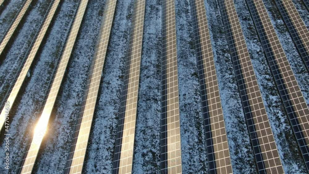 Solar panels in winter during sunset