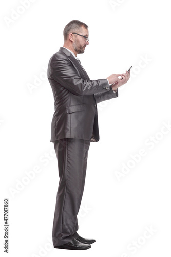 Executive business man with a smartphone. isolated on a white background.