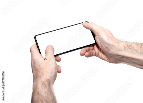 man holding smartphone with blank screen on white background