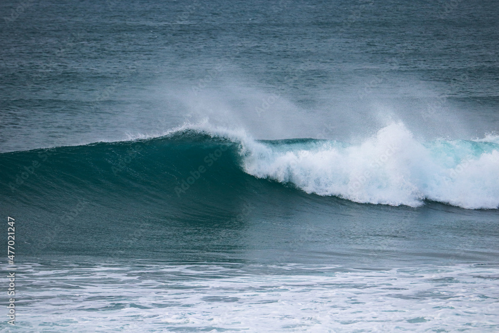 Perfect wave breaking in a beach. Surf spot Perfect wave breaking in a beach. Surf spot