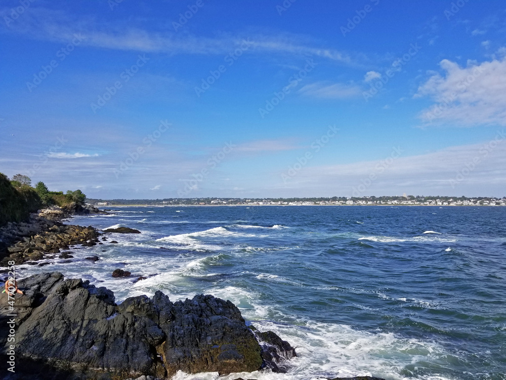 Ocean waves crashing into rocky shore at Newport, Rhode Island
 -08