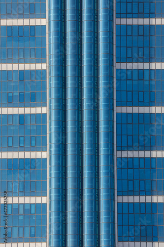 Glass facades of skyscraper...