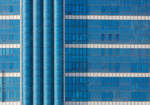 Glass facades of skyscraper...